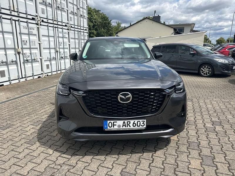 Grau Gebraucht 2025 Mazda CX-60 Homura-Line SUV | 48.619 € (Etwas zu teuer) - Bild 1/4