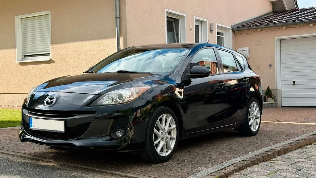Używany Mazda 3 Edition 150 KM (110 kW) 2012 Czarny Sedan/Limuzyna