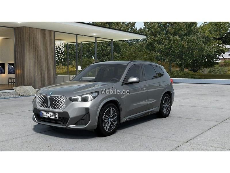 Silber Neu 2025 BMW iX1 Performance SUV | 55.990 € (Fairer Preis) - Bild 1/4