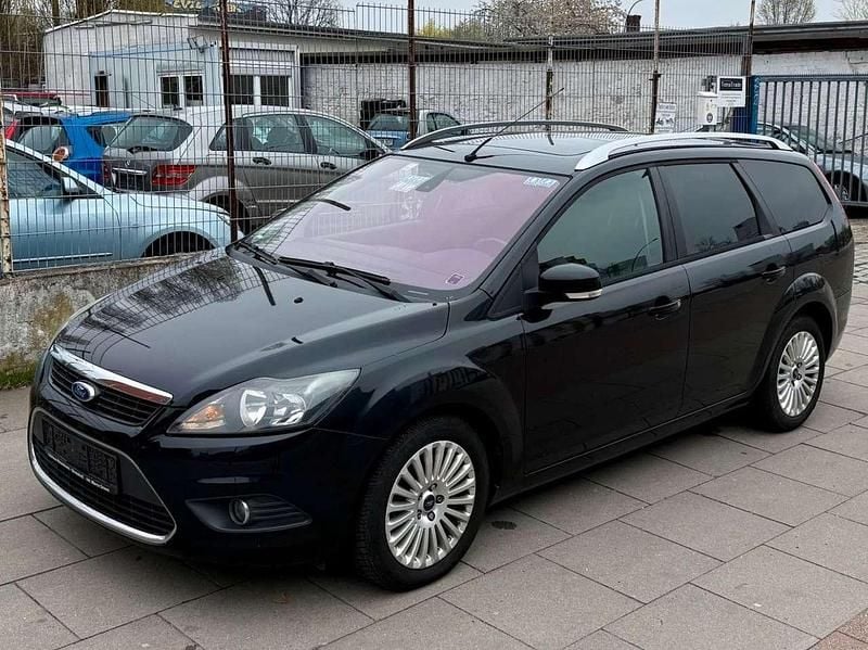 Gebraucht Ford Focus Titanium 109 PS (80 kW) 2010 Pantherschwarz metallic Kombi