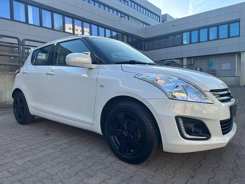 Gebraucht Suzuki Swift Club 94 PS (69 kW) 2015 Weiß Kleinwagen
