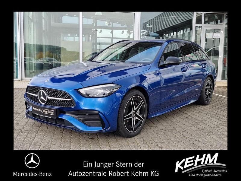 Spektralblau (metallic) Gebraucht 2024 Mercedes C300 AMG Kombi | 44.290 € (Fairer Preis) - Bild 1/4