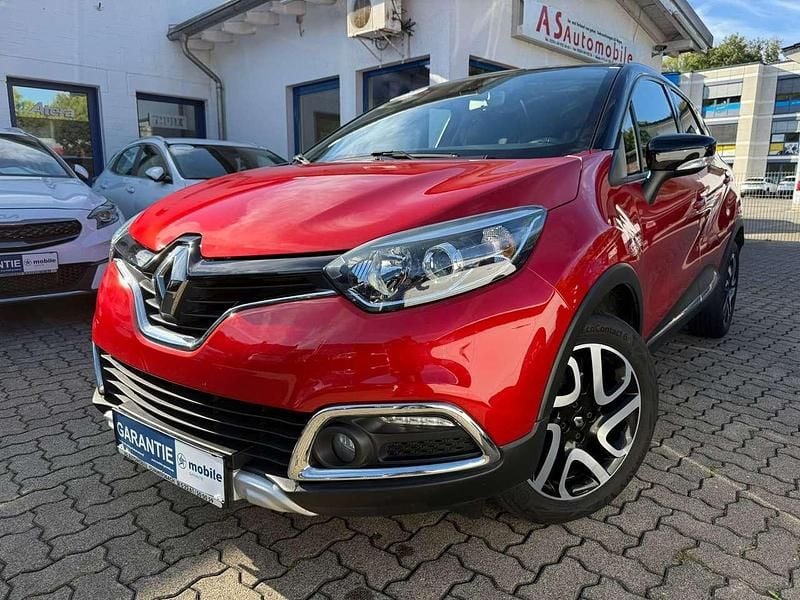 Rot nnp + schwarz gne Gebraucht 2016 Renault Captur Intens SUV | 8.949 € (Fairer Preis) - Bild 1/4