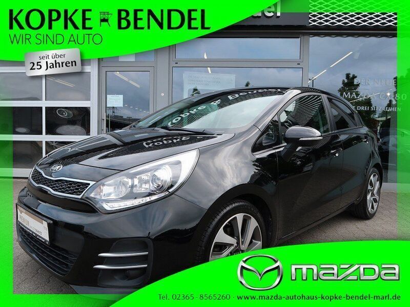 Schwarz Gebraucht 2015 Kia Rio Spirit Limousine | 10.920 € (Teuer) - Bild 1/4