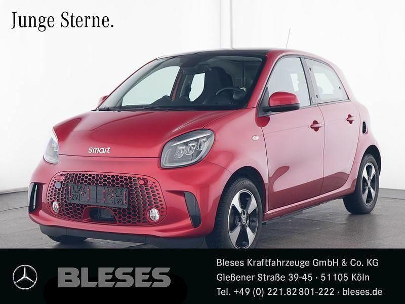 Karosserie in cadmium red () Gebraucht 2023 Smart ForFour Passion Exclusive Kleinwagen | 17.990 € - Bild 1/4