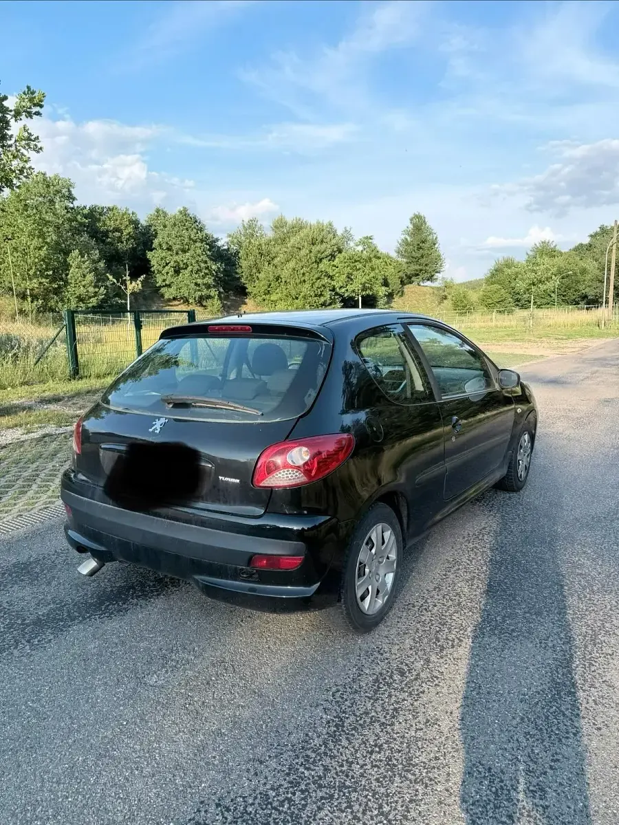 Gebraucht Peugeot 206+ 75 PS (55 kW) 2009 Schwarz Kleinwagen