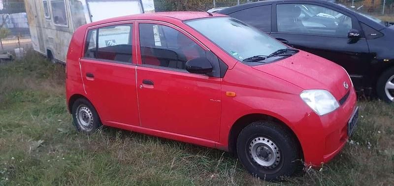 Gebraucht Daihatsu Cuore Plus 58 PS (42 kW) 2003 Rot Kleinwagen