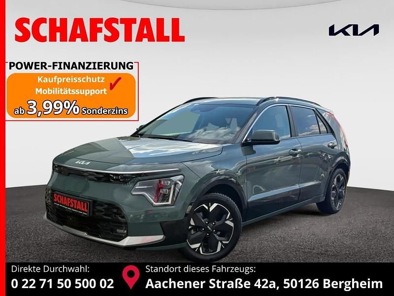 Gruen ((cge) cityscape grün met.) Gebraucht 2023 Kia e-Niro Spirit SUV | 26.979 € (Fairer Preis) - Bild 1/3