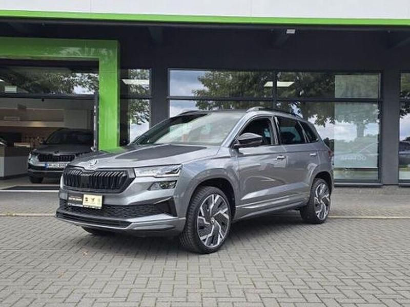 Grau Gebraucht 2022 Skoda Karoq SportLine SUV | 29.990 € (Fairer Preis) - Bild 1/4