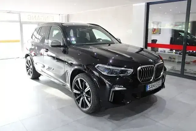 Gebraucht BMW X5 Performance 400 PS (294 kW) 2019 Rubinschwarz individual SUV