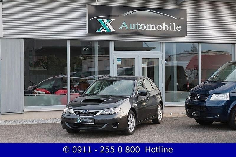 Grau Gebraucht 2009 Subaru Impreza Active Limousine | 3.999 € (Fairer Preis) - Bild 1/4