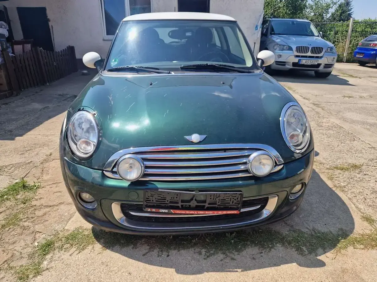 Gebraucht Mini Cooper D 111 PS (81 kW) 2011 British racing green metallic Kleinwagen