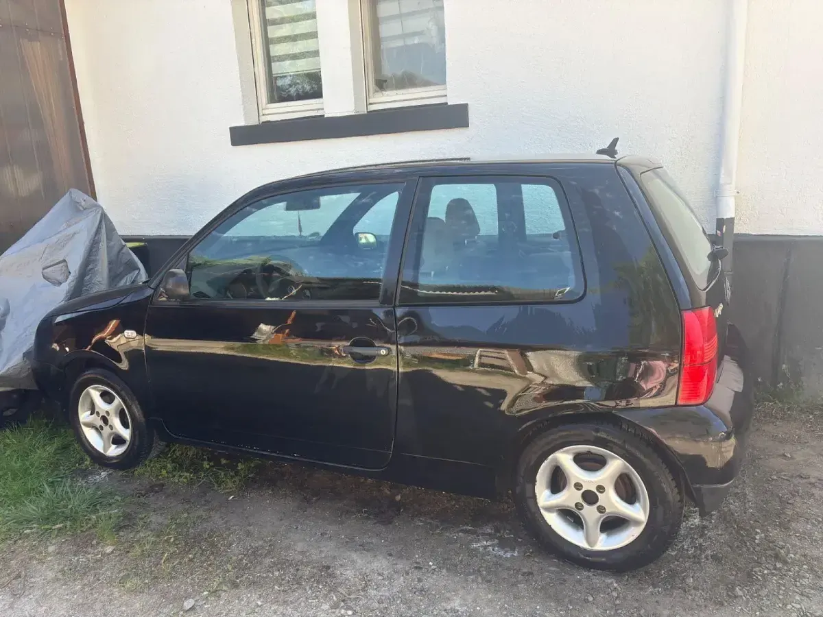 Gebraucht VW Lupo Basis 60 PS (44 kW) 2001 Schwarz Kleinwagen