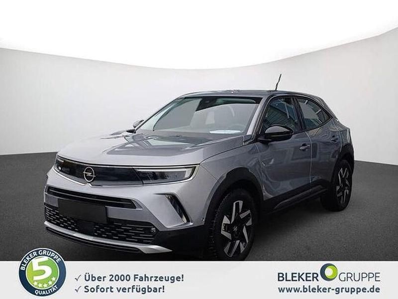 Gebraucht Opel Mokka-e Elegance 100 kW (136 PS) 2022 Kontrast grau/quarz silber SUV