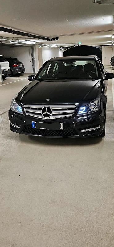Schwarz Gebraucht 2013 Mercedes C200 Limousine | 7.620 € (Superpreis) - Bild 1/4
