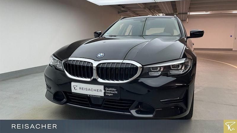 Schwarz ii Gebraucht 2022 BMW 320e Shadowline Kombi | 26.949 € (Superpreis) - Bild 1/4