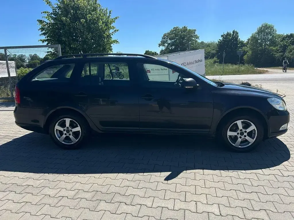 Gebraucht Skoda Octavia Ambition 110 PS (80 kW) 2012 Schwarz Kombi