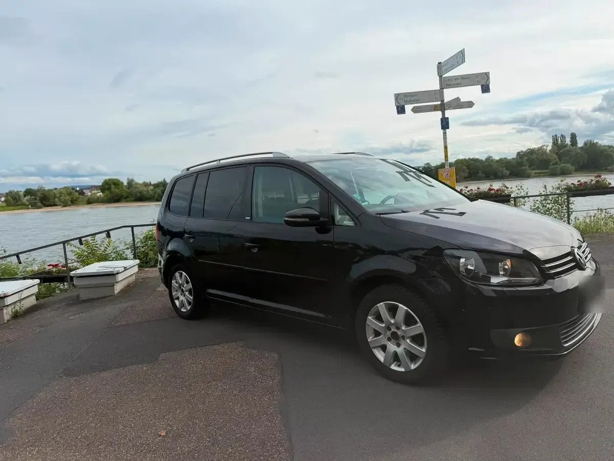 Gebraucht VW Touran 105 PS (77 kW) 2012 Schwarz Van / Kleinbus
