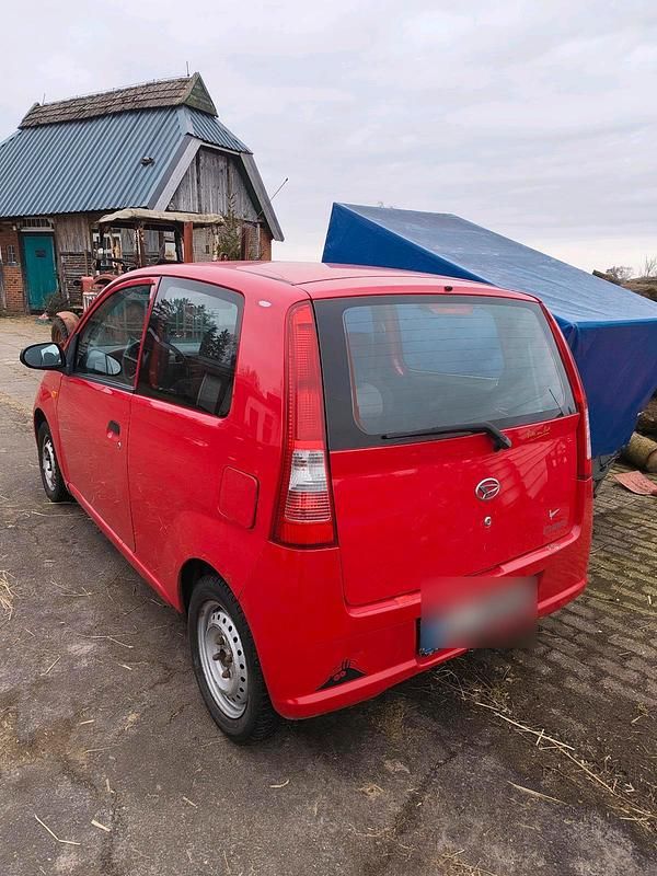Gebraucht Daihatsu Cuore 50 PS (36 kW) 2005 Rot Kleinwagen