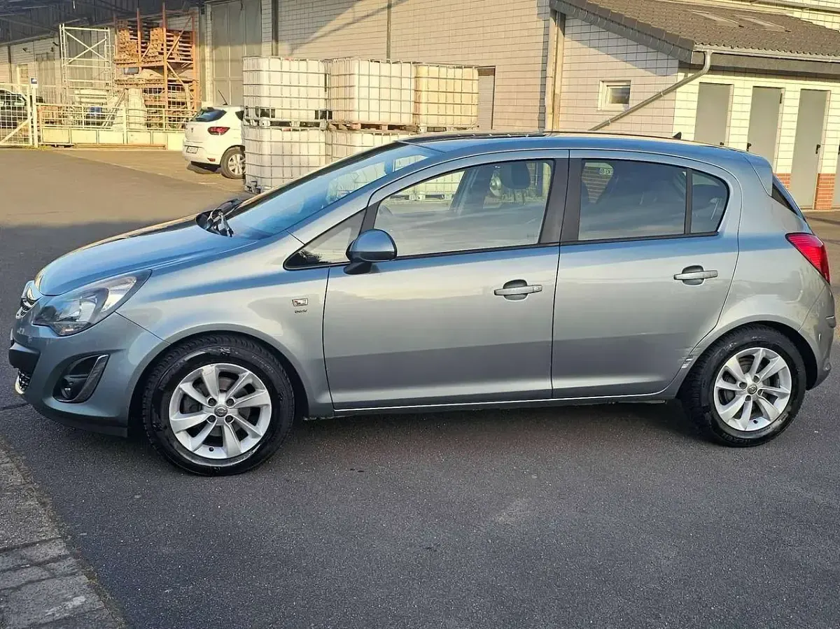 Gebraucht Opel Corsa 86 PS (63 kW) 2014 Silbersee/perl silber (m2) Kleinwagen