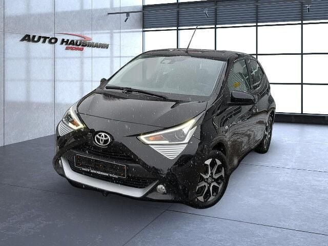 Black mica Gebraucht 2021 Toyota Aygo X Team SUV | 11.450 € (Superpreis) - Bild 1/4