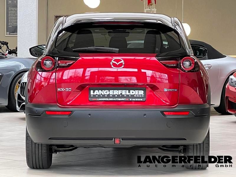 Gebraucht Mazda MX30 Ad'Vantage 106 kW (145 PS) 2023 Soul red crystal m: black roof SUV
