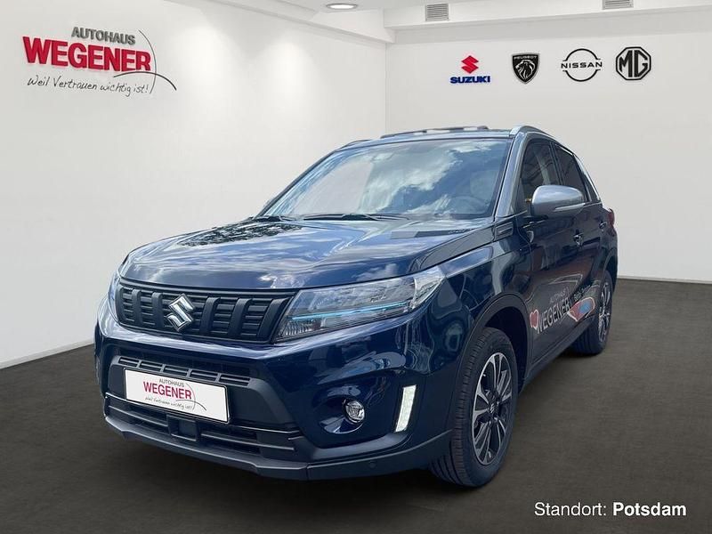 Sphere/galactic gray metallic Gebraucht 2024 Suzuki Vitara Comfort+ SUV | 23.940 € (Fairer Preis) - Bild 1/4