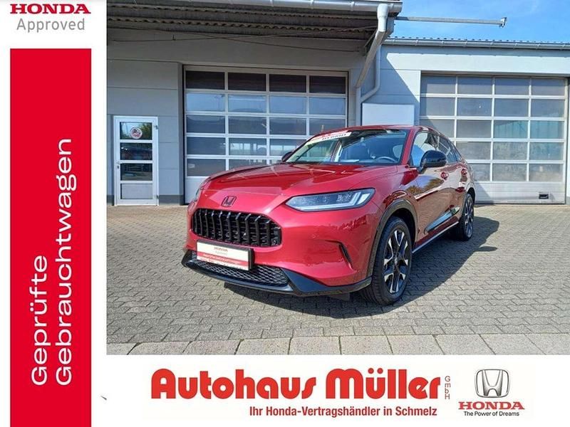 Radiant red metallic Gebraucht 2024 Honda ZR-V Advance SUV | 36.900 € (Fairer Preis) - Bild 1/4