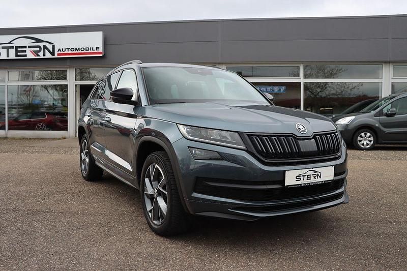 Grau Gebraucht 2021 Skoda Kodiaq SportLine SUV | 26.990 € (Guter Preis) - Bild 1/4