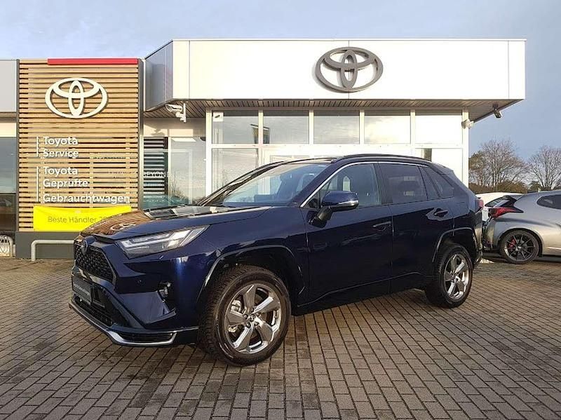 Dark blue metallic Neu 2025 Toyota RAV4 Hybrid SUV | 45.550 € (Superpreis) - Bild 1/4