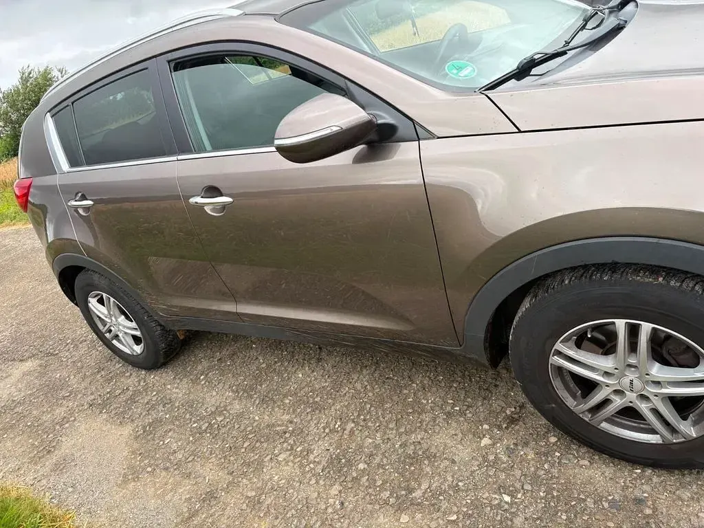 Gebraucht Kia Sportage Edition 7 135 PS (99 kW) 2015 Braun SUV