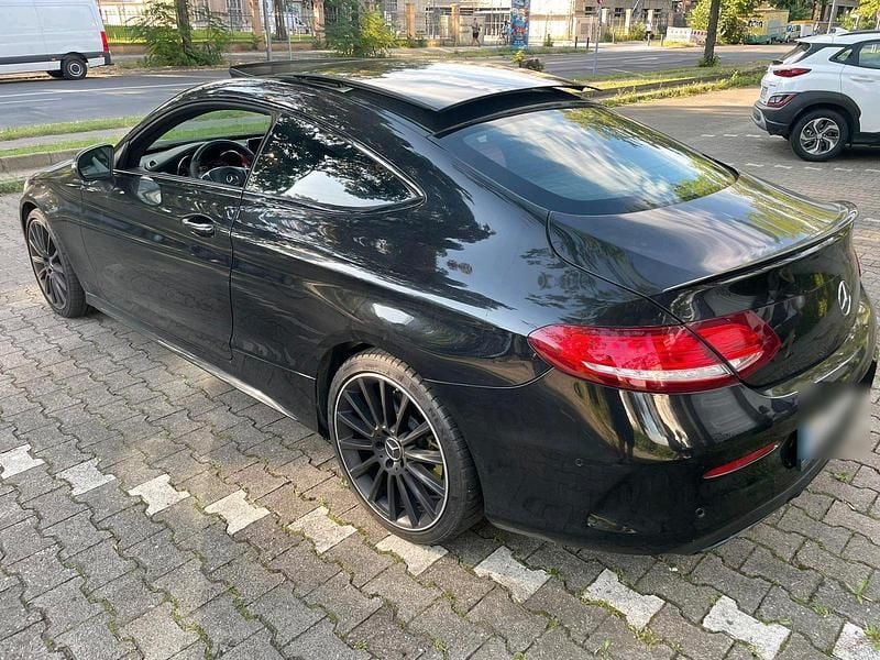 Schwarz Gebraucht 2025 Mercedes C43 AMG AMG Coupé | 28.200 € - Bild 1/4