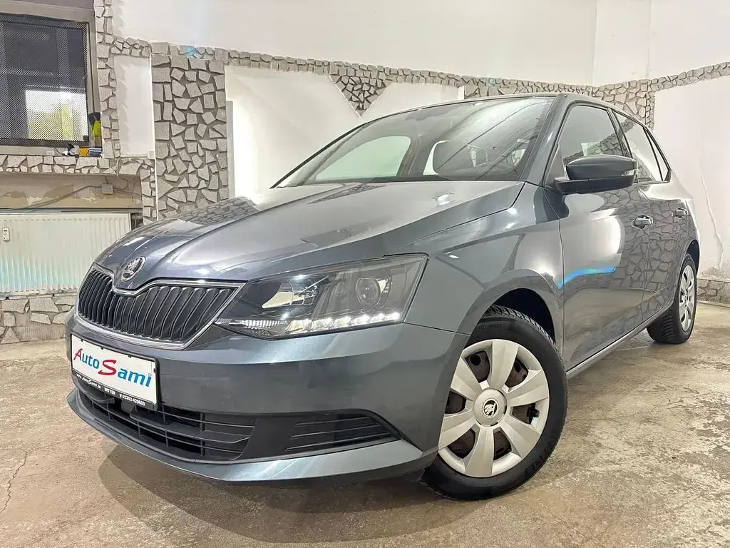 Używany Skoda Fabia 90 KM (66 kW) 2015 Szary Sedan/Limuzyna