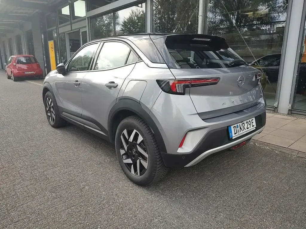Gebraucht Opel Mokka-e Elegance 100 kW (136 PS) 2023 Lack grau artense/typ aussenverkleidung metalliclackierung SUV