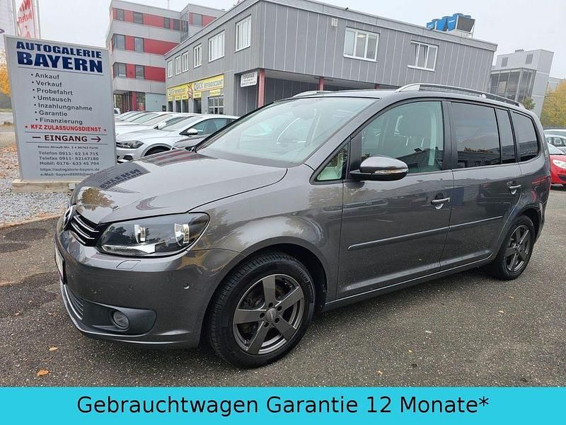 Grau Gebraucht 2011 VW Touran Comfortline Van / Kleinbus | 6.870 € (Fairer Preis) - Bild 1/4