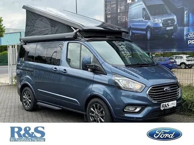Chromablau metallic Neu 2025 Ford Tourneo Custom Limited Limousine | 63.990 € - Bild 1/4