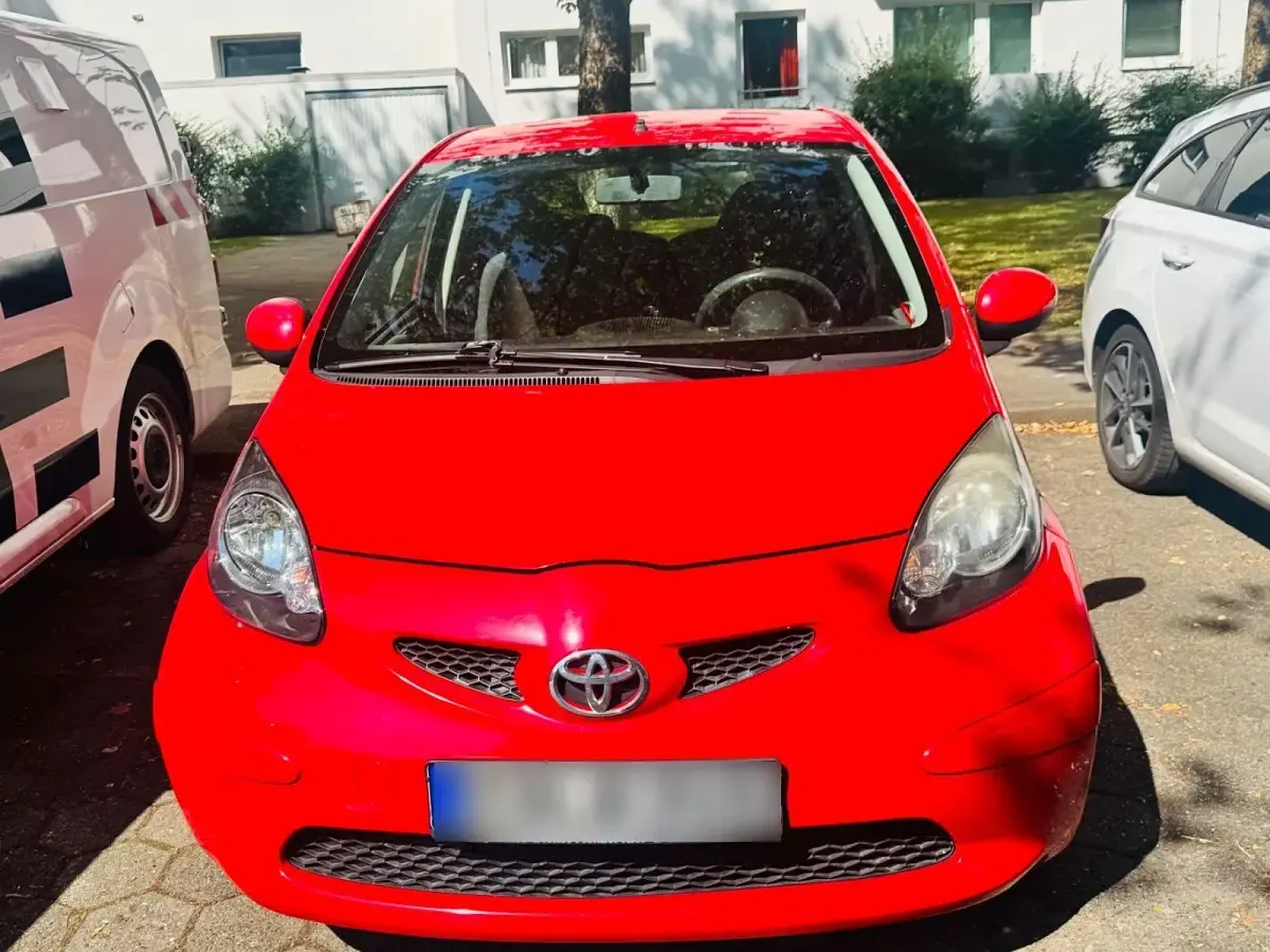 Gebraucht Toyota Aygo 68 PS (50 kW) 2007 Rot Kleinwagen