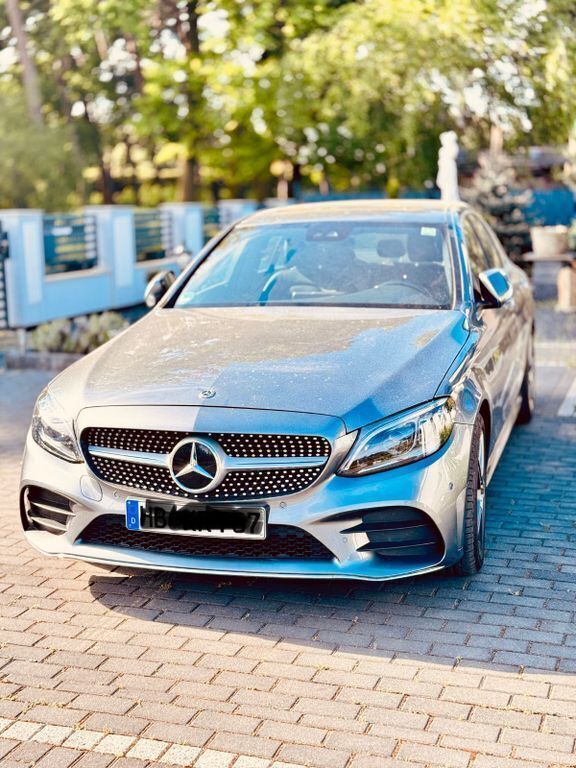 Grau Gebraucht 2021 Mercedes C180 AMG Limousine | 31.499 € (Fairer Preis) - Bild 1/4