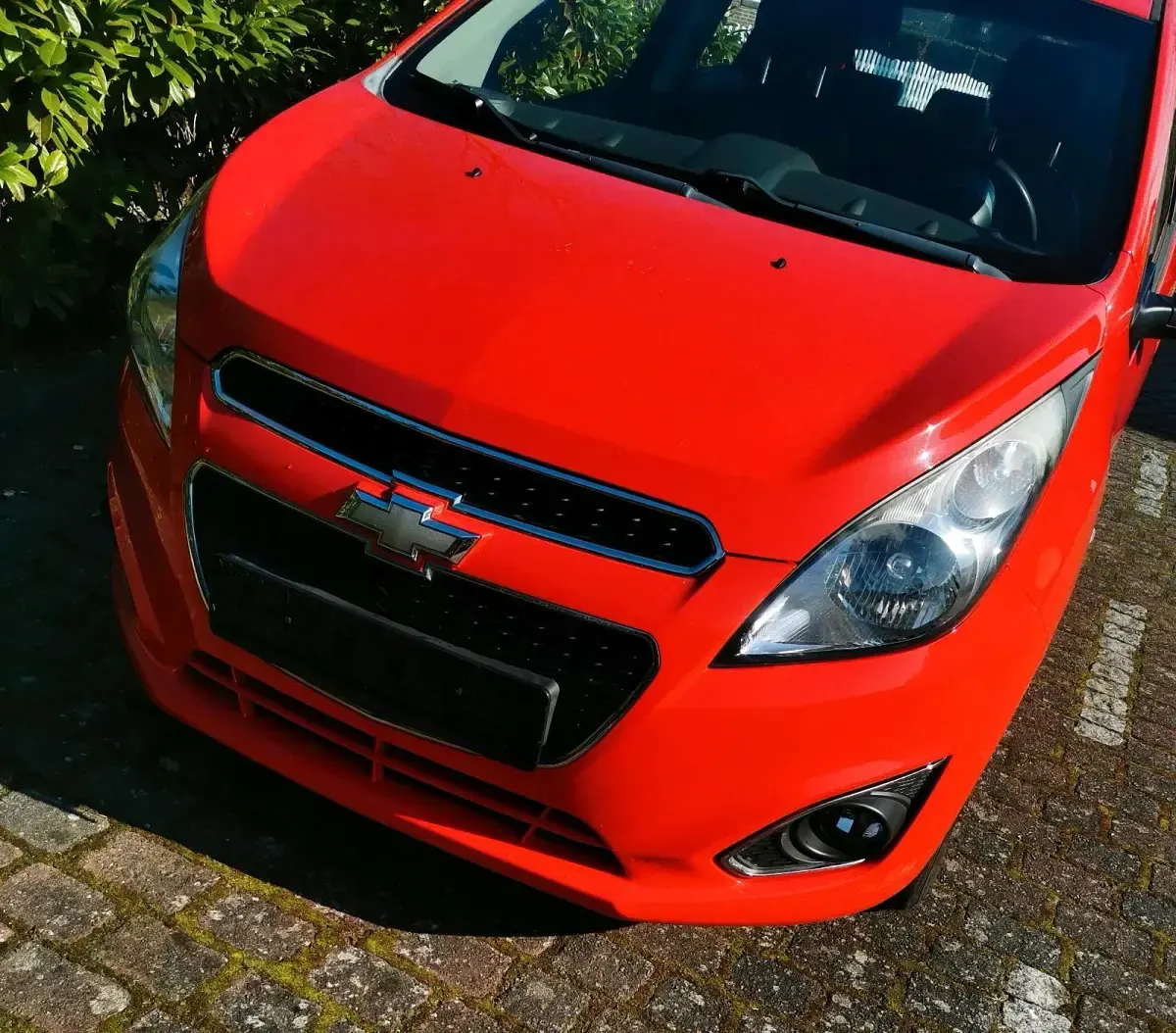 Second-hand Chevrolet Spark 68 CP (50 kW) 2013 Roșu Hatchback