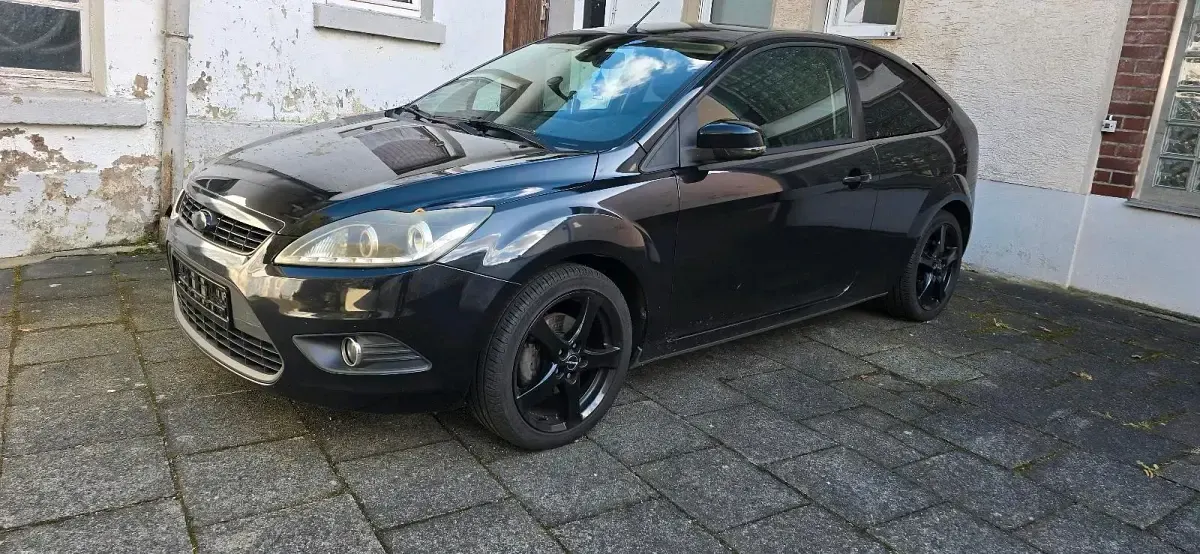 Second-hand Ford Focus 100 CP (73 kW) 2010 Negru Coupe