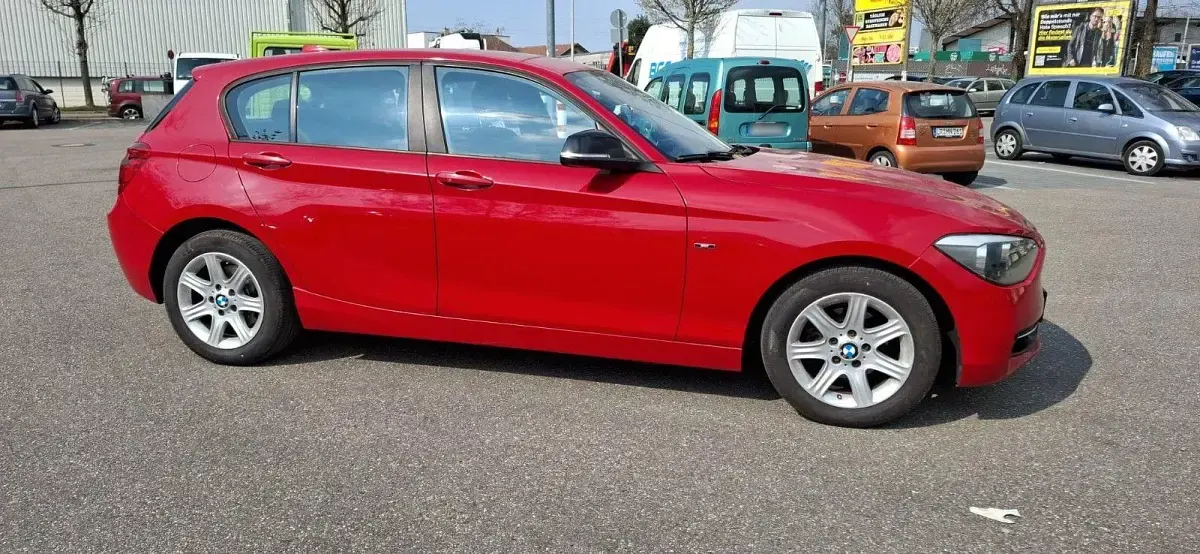 Gebraucht BMW 116 Sport Line 136 PS (100 kW) 2012 Rot Kleinwagen