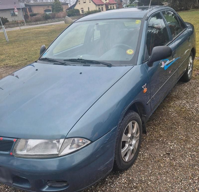 Gebraucht Mitsubishi Carisma 90 PS (66 kW) 1997 Blau Limousine