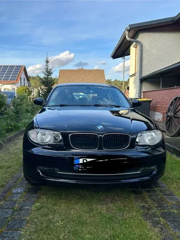 Gebraucht BMW 116 122 PS (89 kW) 2009 Schwarz Kleinwagen