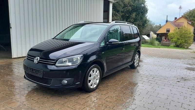 Schwarz Gebraucht 2013 VW Touran Life Van / Kleinbus | 10.990 € (Fairer Preis) - Bild 1/4