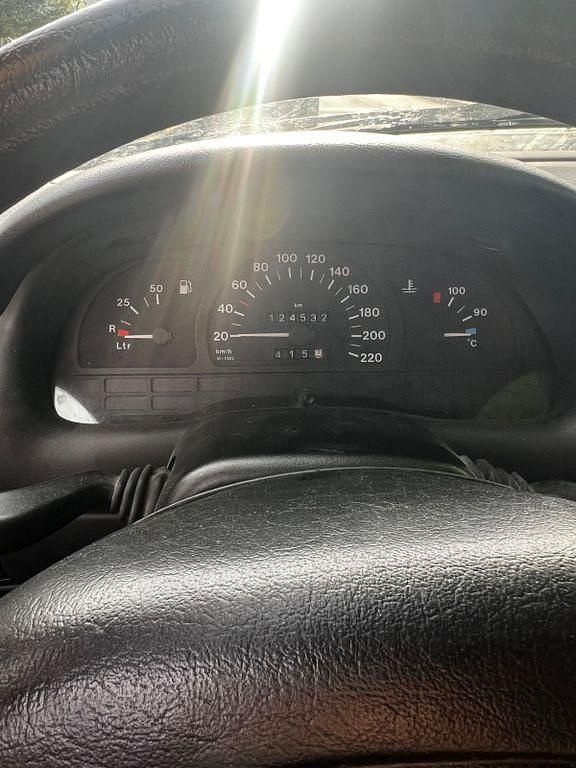 Second-hand Opel Astra 60 CP (44 kW) 1995 Roșu Berlinǎ