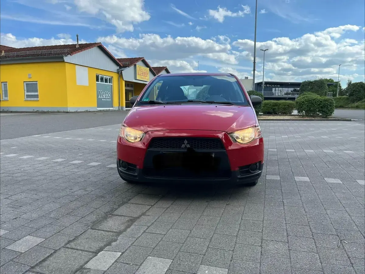 Gebraucht Mitsubishi Colt 95 PS (69 kW) 2009 Rot Kleinwagen