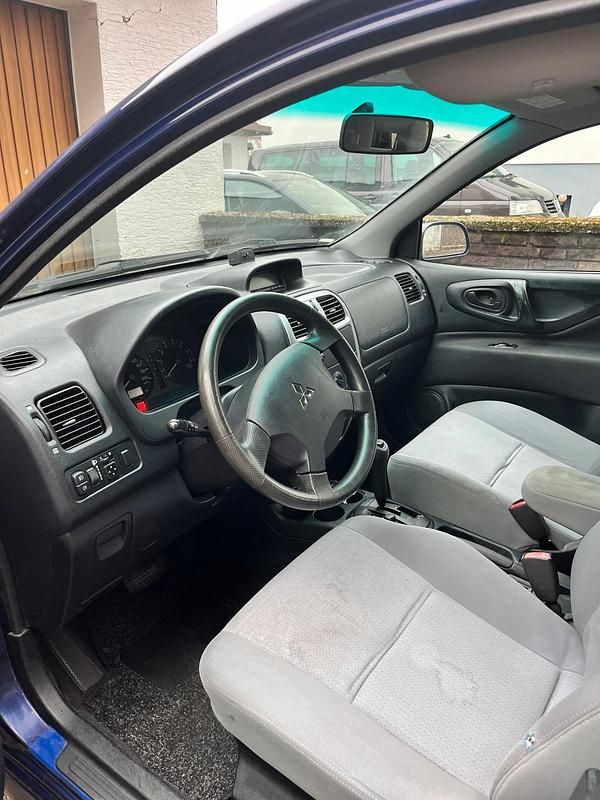 Gebraucht Mitsubishi Space Star 86 PS (63 kW) 2002 Blau Limousine