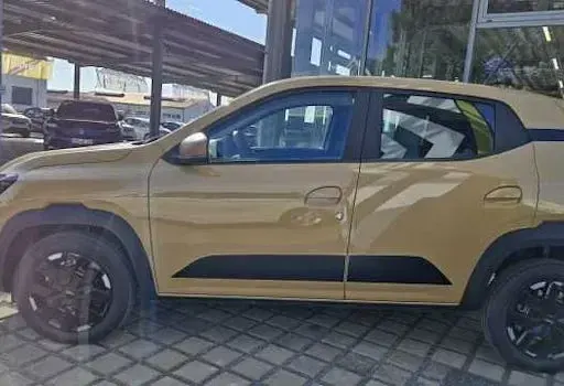 Używany Dacia Spring Extreme 75 kW (102 KM) 2025 Beżowy Hatchback