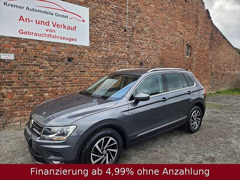 Indiumgrau Gebraucht 2018 VW Tiguan Join SUV | 18.490 € (Fairer Preis) - Bild 1/4