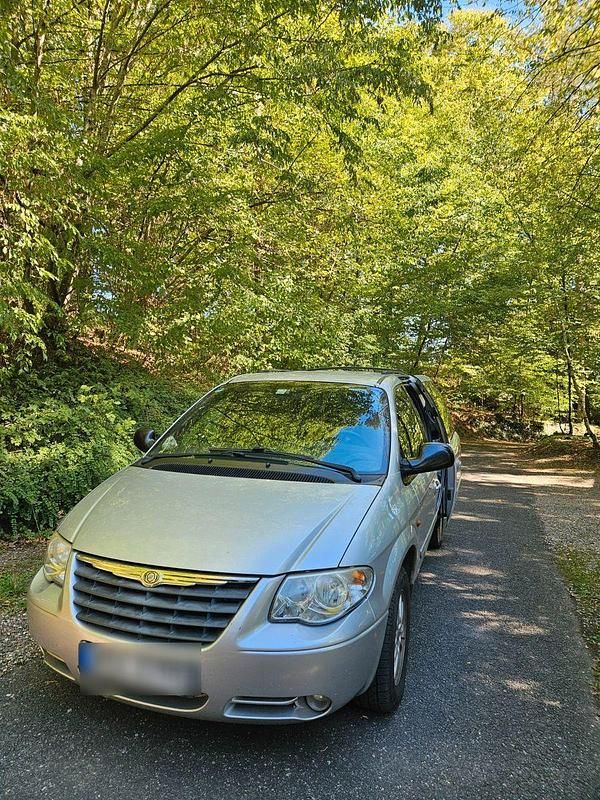 Silber Gebraucht 2006 Chrysler Voyager Van / Kleinbus | 600 € - Bild 1/4